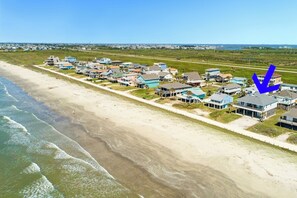 "Step out your door and feel the sand between your toes – beachside bliss awaits!