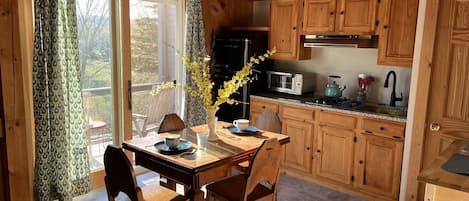 Dining and kitchenette with awesome views of  CT's rolling hills.
