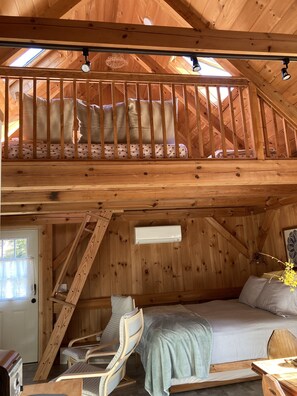 New ships ladder up to the cozy loft.  Two  twin beds and nice view.