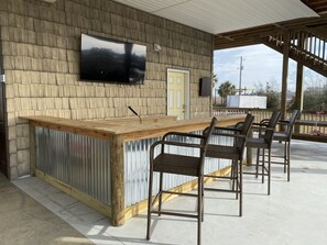 Built-in bar area with smart TV - great to hang and watch sports.