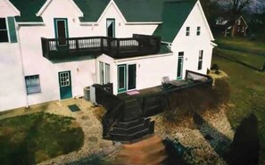 Back deck(s) of mansion