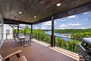 Huge deck off the main level living room with a great view of the lake