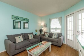 Cozy living area with full size sleeper sofa