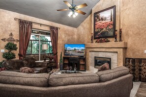 Enjoy the View – The comfortable, curved sectional faces a large, flat-screen HDTV and the cozy fireplace, so you’ll always have the best view, no matter which you’re watching.