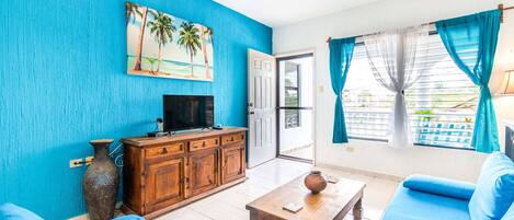 Brisa Marina’s Mex-style living room, clean & bright with sea blue & sandy beach colors!