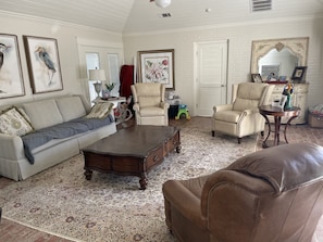 Large family room that opens to pool and bbq patio