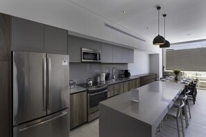Modern elegance meets culinary convenience in the kitchen of this La Marina sanctuary.