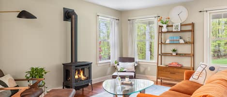 welcome to your cozy smoking room with a library and gas fireplace to snuggle