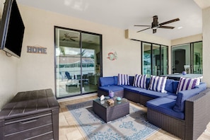 Live the SW Florida lifestyle in the homes great outdoor living space, accessible from the living, dining & master bedroom.