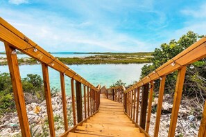 Stairs to walk on down, touch the water and enjoy views from lagoon level.