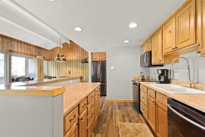 Fully-equipped kitchen with stainless steel appliances