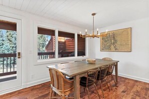 Dining area with seating for up to 8 with access to the outdoor patio