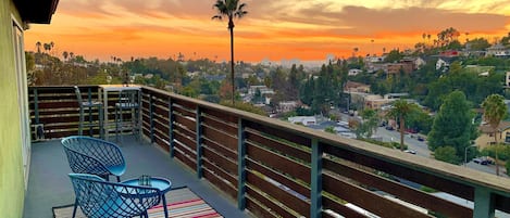 A large deck offers sweeping views of one of LA's most vibrant neighborhoods.