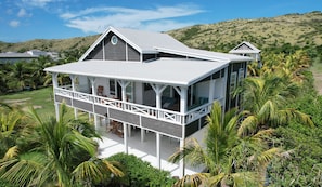 Second floor has 2 bedrooms with ensuite bathrooms and outdoor showers.