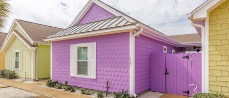 Colorful cabana front entrance through gate