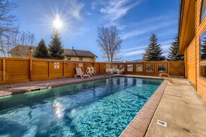 Features heated outdoor pool, hot tubs, sauna, outdoor play area for kids