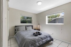 This bedroom has a queen-size bed. Sheets are high quality and mattresses are new, comfortable, and well protected with mattress encasement, and waterproof mattress protectors.