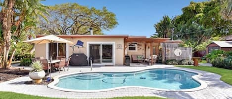 Beautiful backyard with pool. 