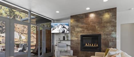 Living room with smart TV, gas fireplace