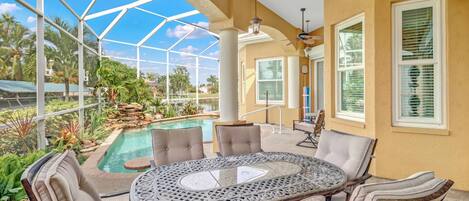 Step outside and dine by the pool, with the comfort of shaded cover and ceiling fans.