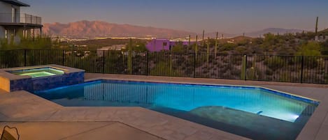 Backyard pool with hot tub and views of the Catalina Mountains