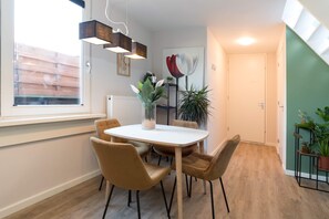 Cozy dining area for four guests—ideal for breakfast or a homemade dinner.