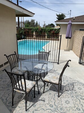 Dine, visit, play games on a private access patio.