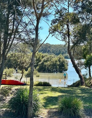 The view from the verandah - our gate goes to the inlet. High tide