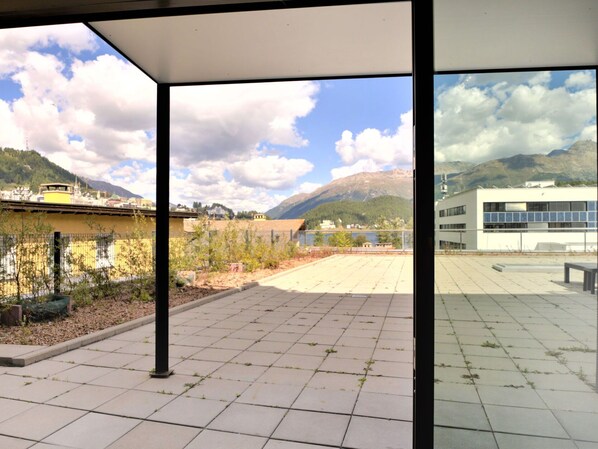 Cloud, Sky, Plant, Daytime, Building, Property, Window, Shade, Azure, Mountain