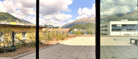 Cloud, Sky, Plant, Daytime, Building, Property, Window, Shade, Azure, Mountain