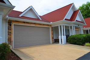 Personal garage attached to Villa for a total space that fits vehicles.