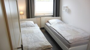 Schlafzimmer 1 der Ferienwohnung Meeresleuchten in Wittdün auf Amrum