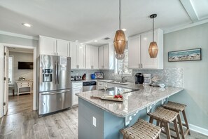 Fully Stocked Kitchen with Bar Seating for 3