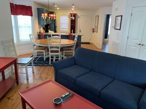 Living area is equipped with a queen-sized sleeper sofa for extra sleeping space