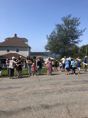 Street view, enjoying Chestico Days parade.  Ocean and island in the background 