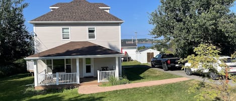 Front of house, street view, Port Hood Island in the background