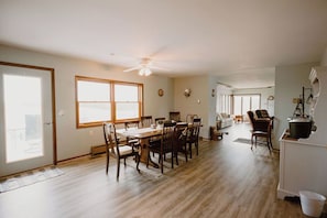 A dining room that seats up to ten with room to add a folding table and chairs. 