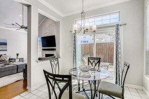 Kitchen dining table w/ access to the patio to get some fresh air