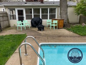 A Poolside Grill and Seating Area