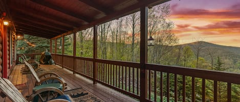 My wife's happy place! Awe-inspiring mountain views from the covered porch. 