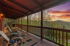 My wife's happy place! Awe-inspiring mountain views from the covered porch. 