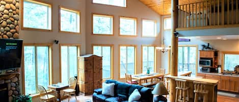Welcome to 4040 Shaggy Bark cabin's wall of windows! So bright and cheery!