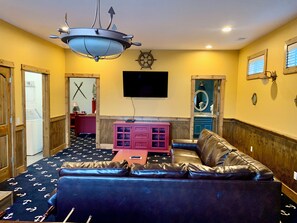 The downstairs bedroom is pirate themed, and had a game room for the family