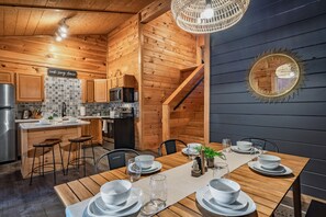 Intimate kitchen and dining room with all you need to spend time indoors cooking with family and friends