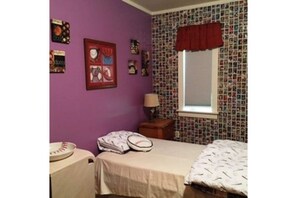 Kids love this room!   Wall is custom decorated entirely with baseball cards.   