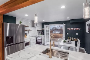 Fully Stocked Kitchen with Walkout Patio Door