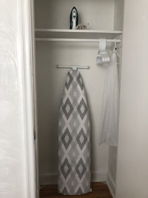 Master bedroom Closet with Iron and Ironing Board