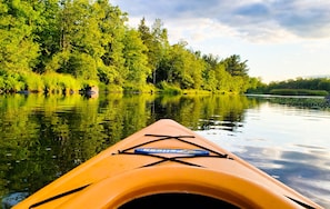 Grab one of the provided kayaks to take in nature and extraordinary sunsets.