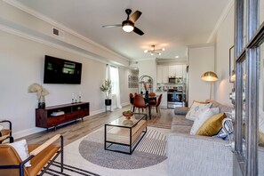 View of the living room and dining room from the front door 