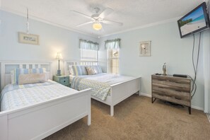 Twin and Queen beds in the second bedroom overlooking the park.